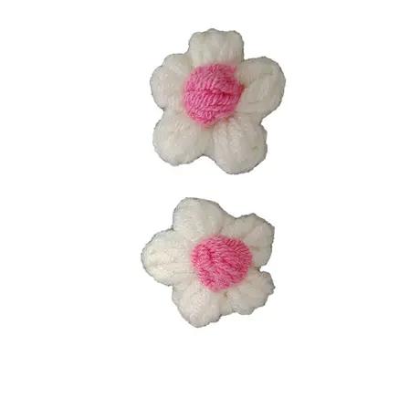 Little puff-white flower and rose red heart