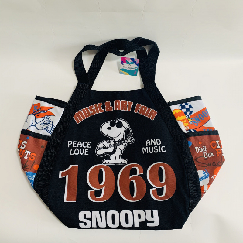 New large-capacity mommy bag with multiple cartoon puppy patterns, available as a shoulder bag or handbag