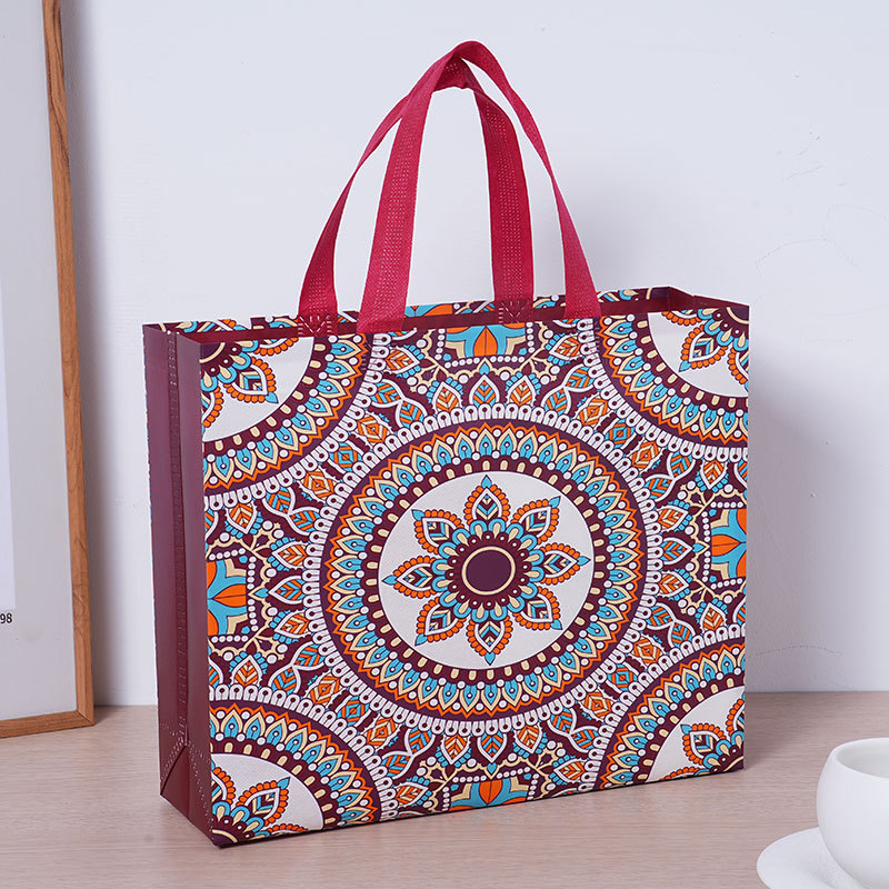 Bolsas de ropa de estilo nacional bolsas de mano de tela no tejida multicolor bolsas de embalaje personalizadas bolsas de mano de cosméticos mayoristas image 7