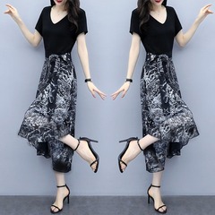 夏の婦人服の気質は腰を収めてやせている半袖のワンピースの女性が流行します。
