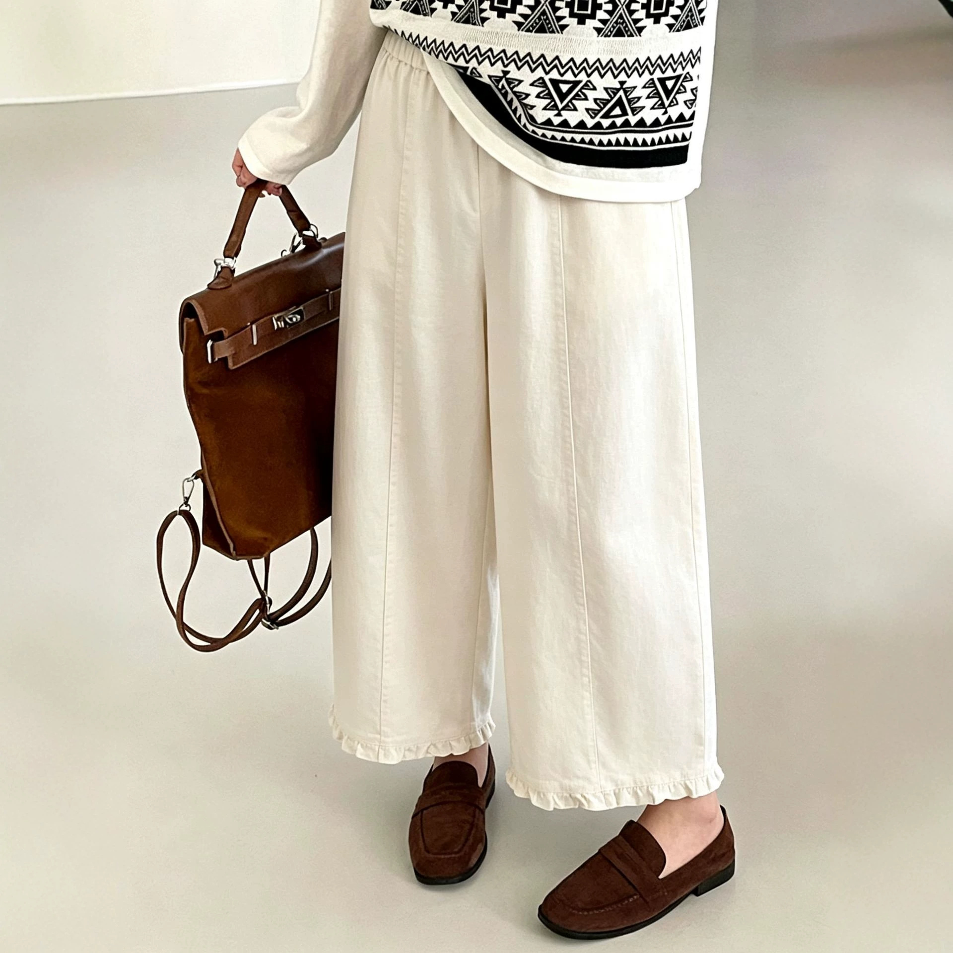 Plus-size women's drawstring wide-leg pants with ruffled trim, 2026 autumn collection, loose-fitting casual straight-leg pants for curvy women