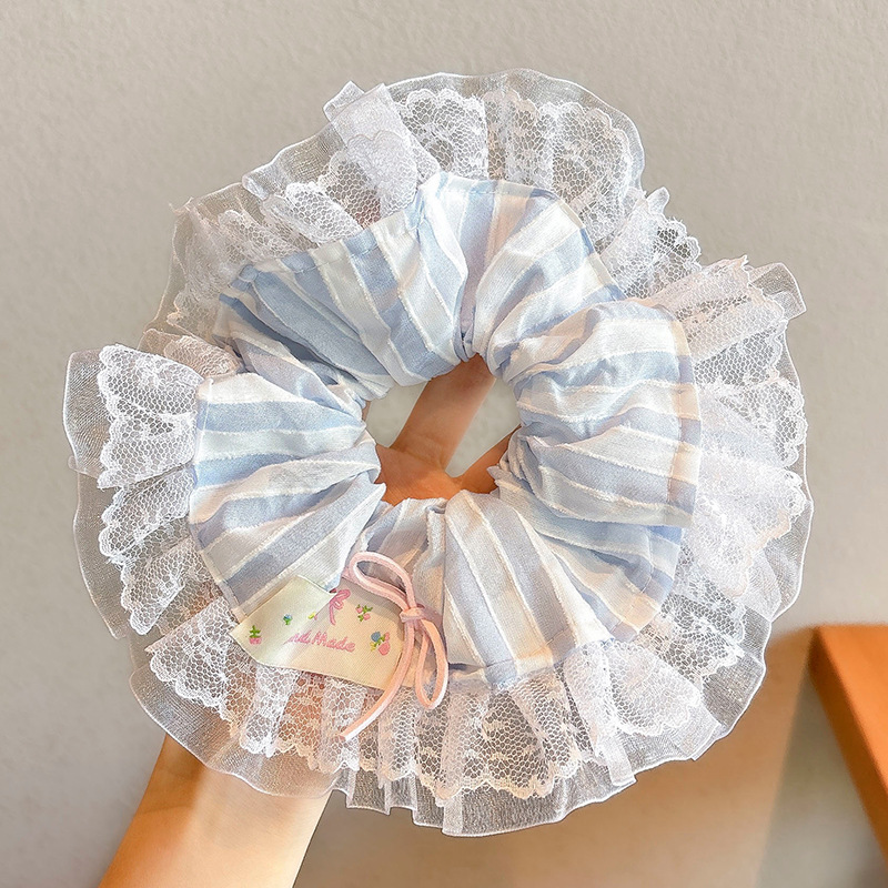 2#Coletero de rayas azules de unos 20cm.