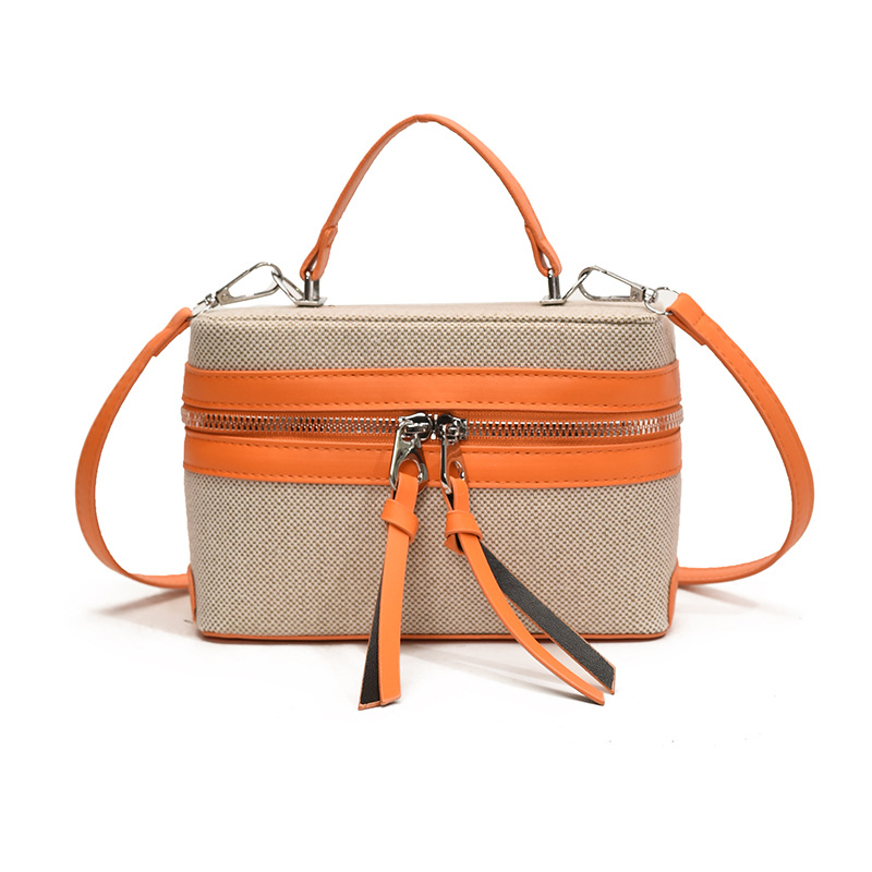 2025 nuevo nicho de diseño retro color contrastante empalme bolso de mano personalidad viaje elegante mochila de hombro