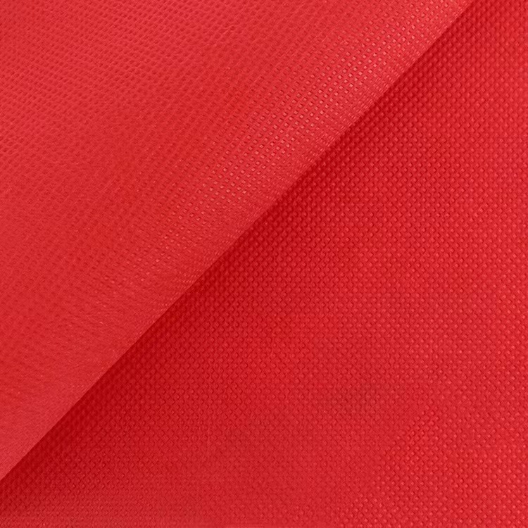 Fábrica de material PP no tejido spunbond rojo 80g 100g bolsa de almacenamiento de mano de compras no tejido rojo