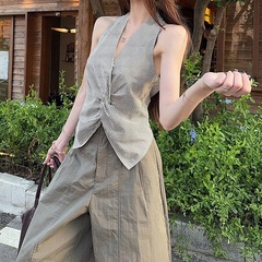 ホットガールデザインストライプホルターネックツイストベストワイドレッグカジュアルパンツ女性のための 2025 夏の新しいファッションスーツ