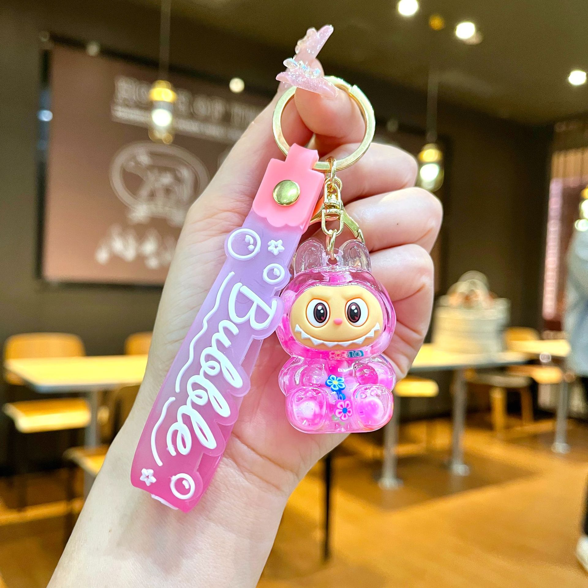 Llavero red acrílico con arena flotante