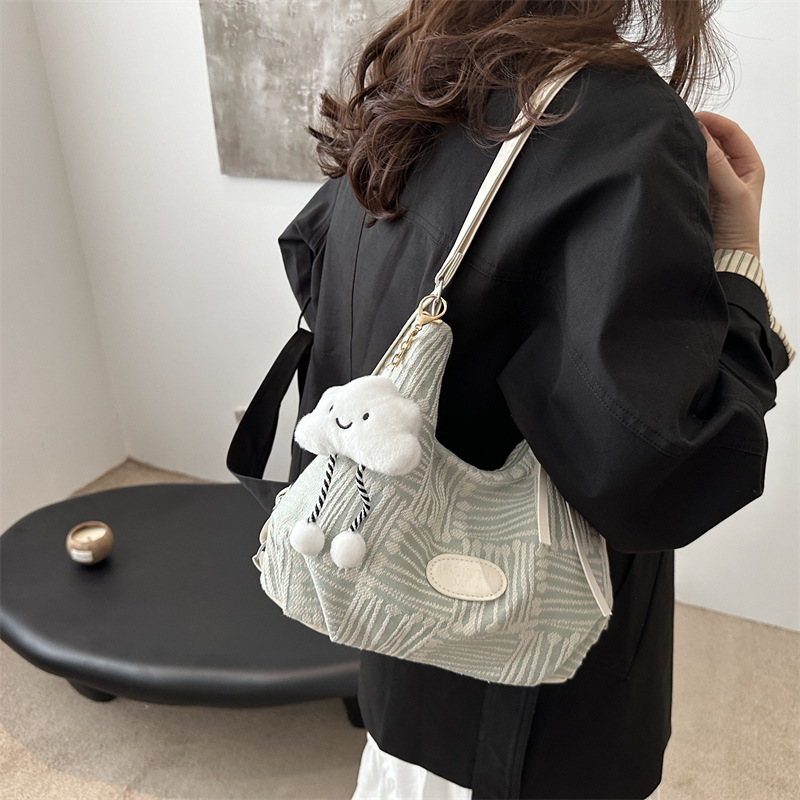 Bolso de lona para mujeres 2024 nuevo otoño bolso universitario de doble propósito mochila de hombro de viaje universal mochila de hombro