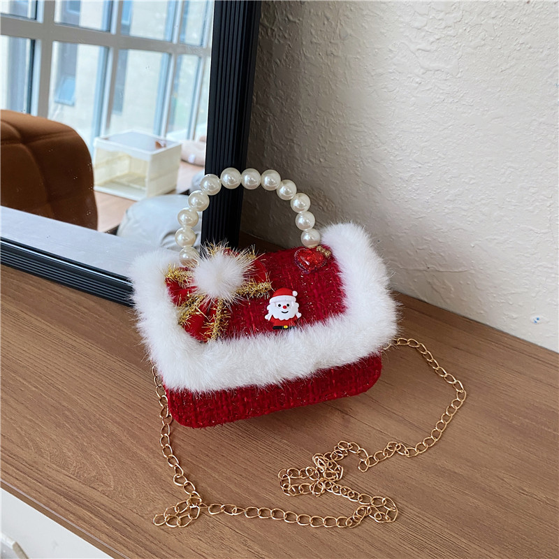 Mini moda para niñas bolso de cambio de perlas 2024 nuevo patrón de moda coreana bolso de ropa infantil