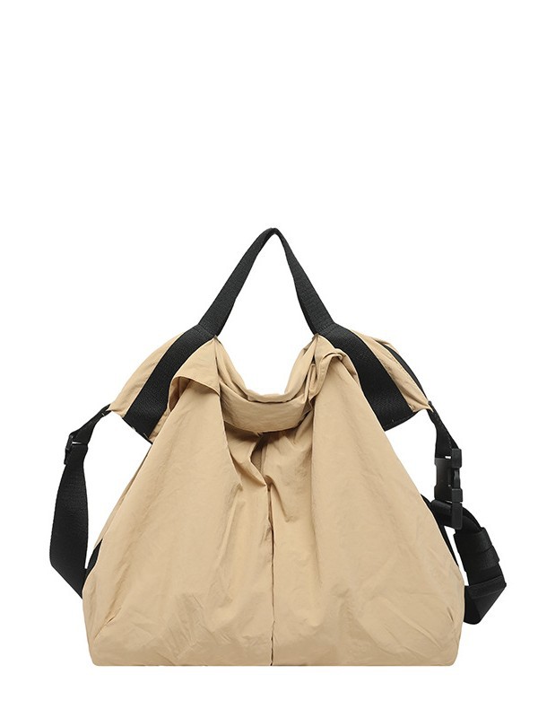2026 nuevo bolso de nylon coreano ligero de gran capacidad bolso de tela de viaje casual versátil bolso de hombro resistente al desgaste mujer