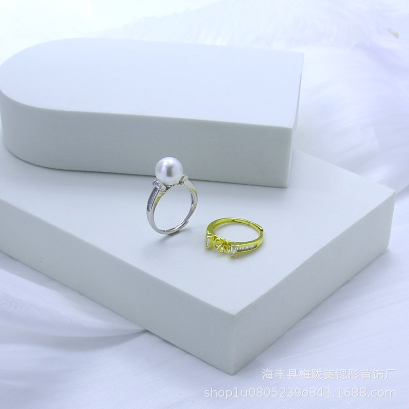 Rectangular small design ring with stone with zircon