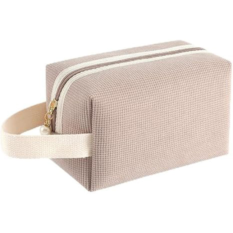Soft handheld cosmetic bag