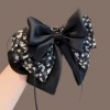 Black ponytail, floral print