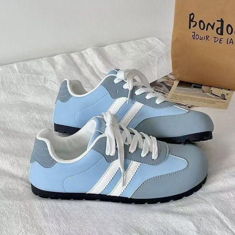 Mujeres 2026 primavera y otoño nuevo estilo de estilo de campus zapatos casuales de fondo plano de moda zapatos blancos de cabeza redonda de verano transpirables
