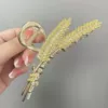 Golden two-leaf wheat ears