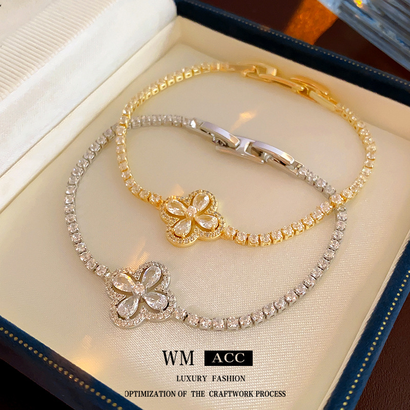 Oro real electrochapado ZIRCON flor hebilla pulsera moda todo-fósforo pulsera luz lujo alto sentido pulsera para las mujeres al por mayor