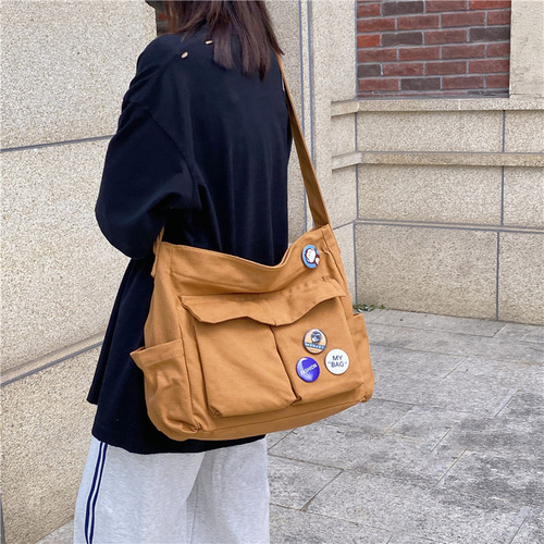 Workwear style single-shoulder crossbody bag for men and women, Instagram canvas bag, student school bag, street style large capacity, literary and leisure bag
