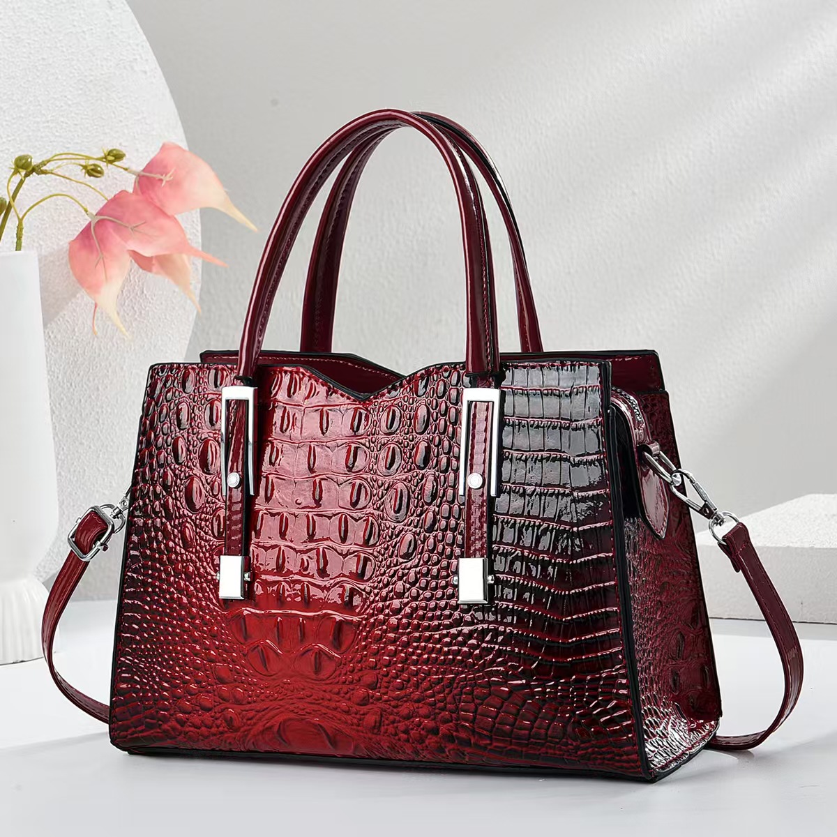 Emperor rinoceronte retro nicho bolso de mano mujer 2025 primavera y verano patrón de cocodrilo todo fósforo pequeño bolso de transporte nuevo