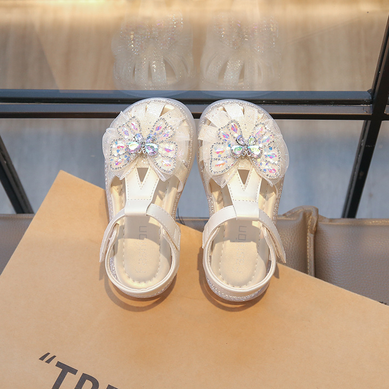 Niñas sandalias Baotou 2026 verano nuevo arco de moda zapatos de suela suave zapatillas de princesa casuales niños image 7