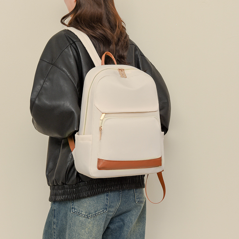 Mochila para computadora de 14 pulgadas para mujer 2024 nueva mochila casual para mujer moda color de contraste mochila escolar para estudiantes de secundaria al por mayor