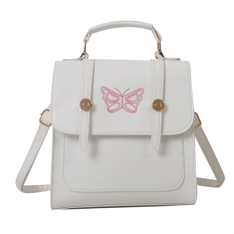 Estilo británico estilo coreano diseño de nicho ins hombro mochila bolso de las mujeres bolsa de cubo estilo universitario 2023 nueva bolsa de mensajero