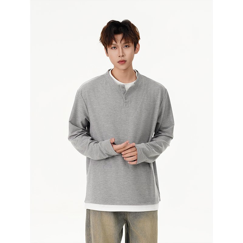 Trendy Hong Kong style faux two-piece long-sleeved base layer top for teenage boys, new spring and autumn style, fashionable, casual and versatile.