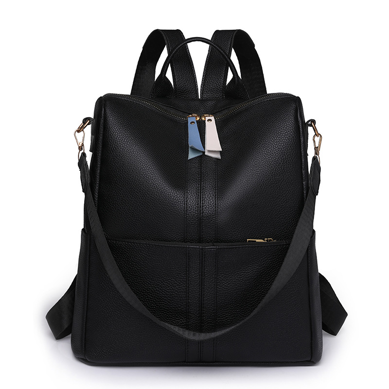 Spot al por mayor 2023 nueva mochila de cuero suave para mujer casual simple y versátil mochila de viaje de gran capacidad