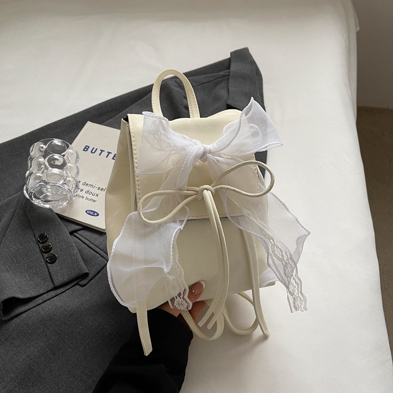 Gran capacidad coreana encantadora mochila de moda de ballet para mujeres 2024 nuevo bolso de cubo de arco de verano