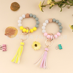 Silicone Bracelet Tassel Wooden Beads Key Ring Silicone Bracelet Beads Mobile Phone Case Bluetooth Headset Pendant Beads Bracelet