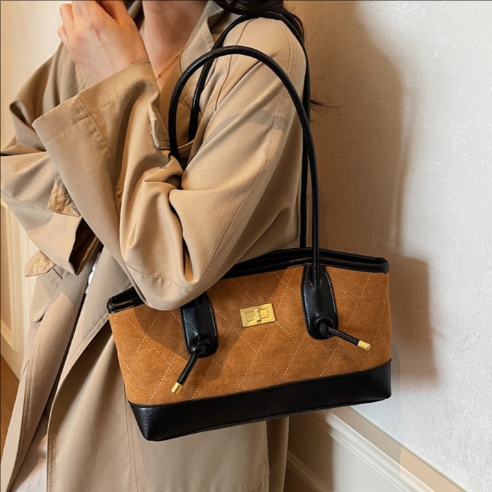Bolsa de mano transfronteriza de alto nivel, bolso de celosía casual para mujeres, otoño y invierno 2025, nueva bolsa de hombro casual de gran capacidad.