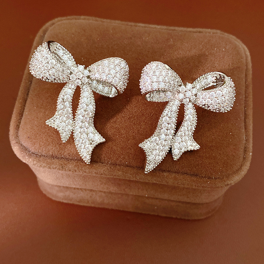 Agujas de plata de piedra de arco pernos de estilo europeo y americano personalidad temperamento nicho pendientes ligeros de lujo alta sensación de auriculares al por mayor image 7