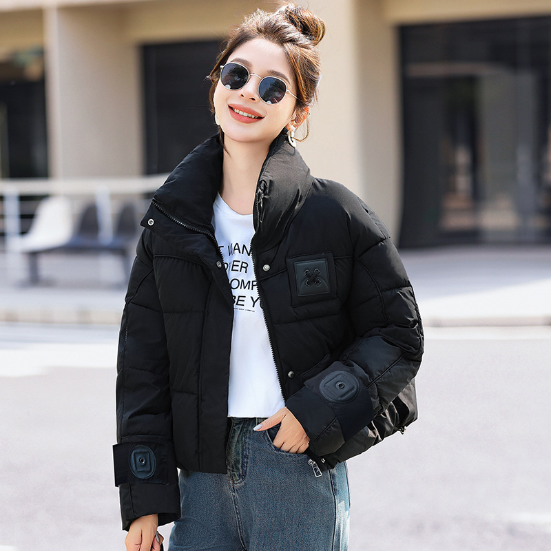 2025 ropa de algodón de pluma para mujeres gruesa corta encapuchada abrigo de moda suelto delgado chaqueta de algodón de invierno ropa de pan caliente