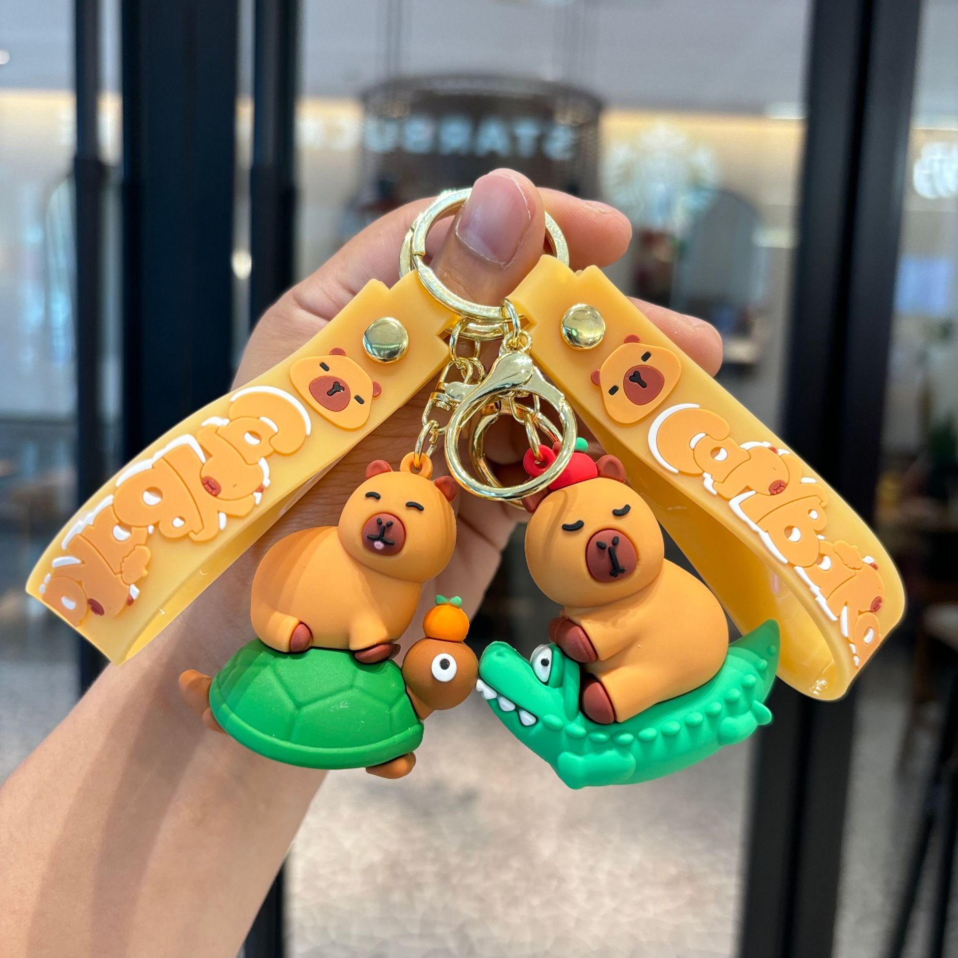 Tarjeta de dibujos animados llavero pibala creativo carpincho mochila colgante llavero de coche máquina de muñecas para niños regalo