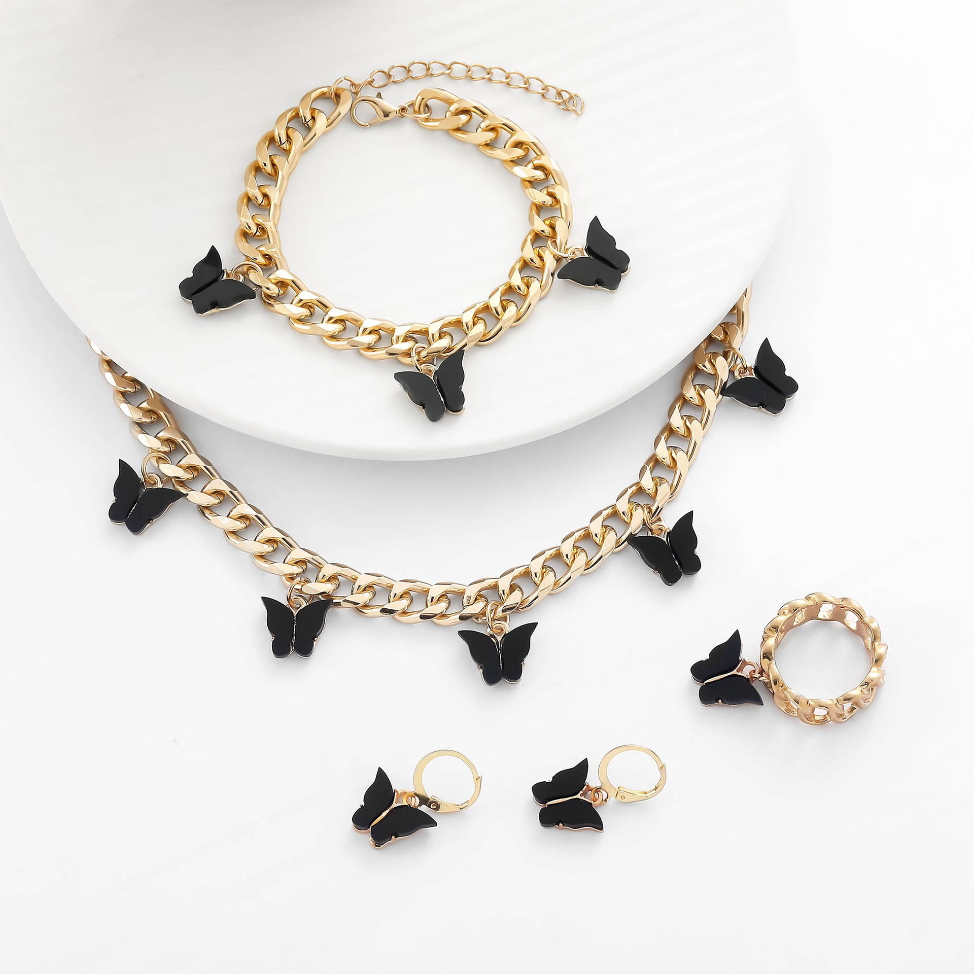 Set di gioielli in acrilico con catena a artiglio e diamanti_voghion.com