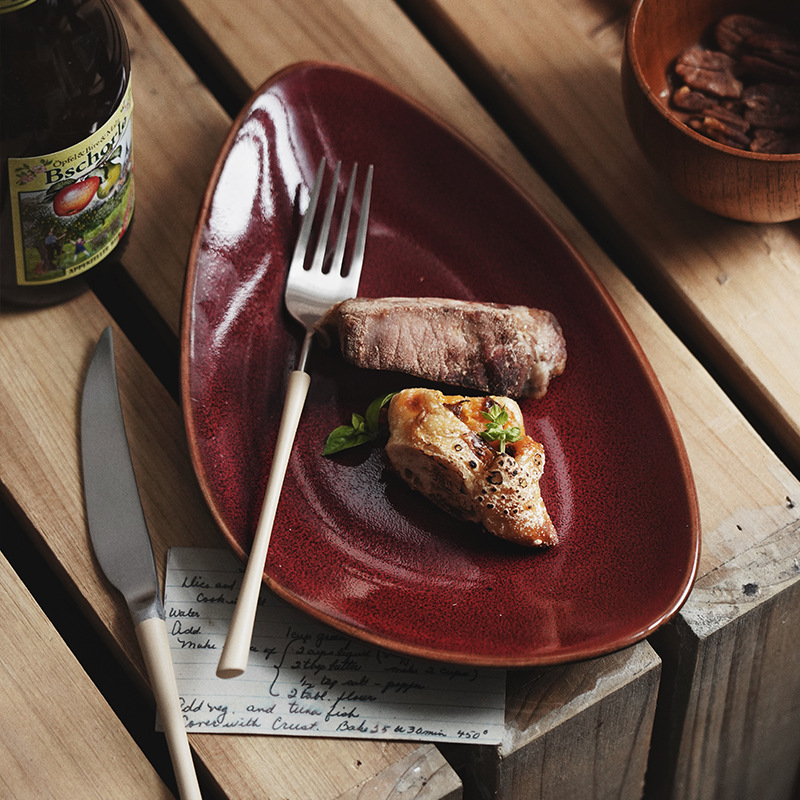 Horno de estilo japonés plato de pescado elíptico irregular de cerámica vajilla de restaurante especial plato de filete plato de sushi plato de restaurante occidental transfronterizo