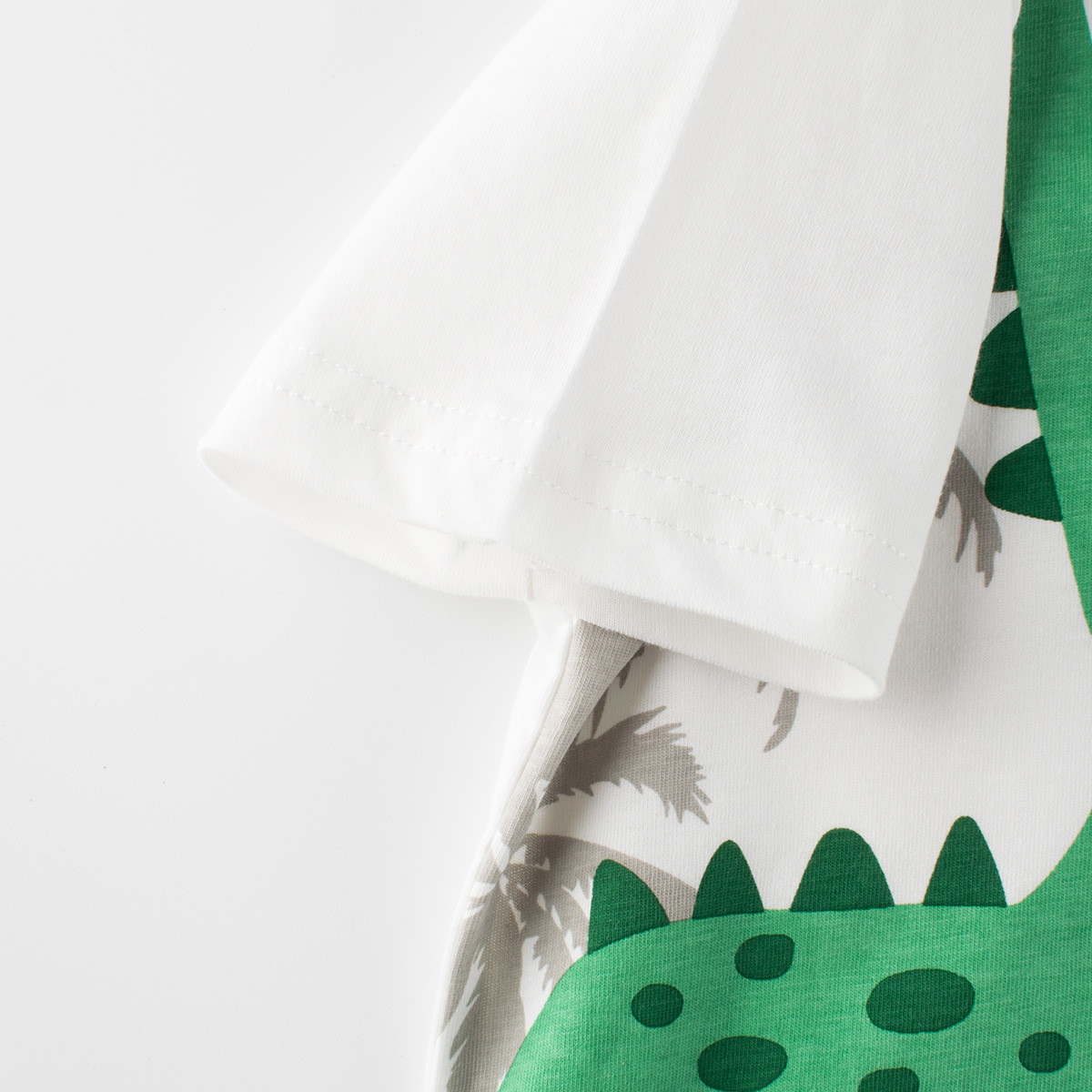 27kids ropa para niños transfronterizos ropa para niños camiseta de manga corta coreana para niños verano nuevo estampado de dibujos animados de dinosaurios