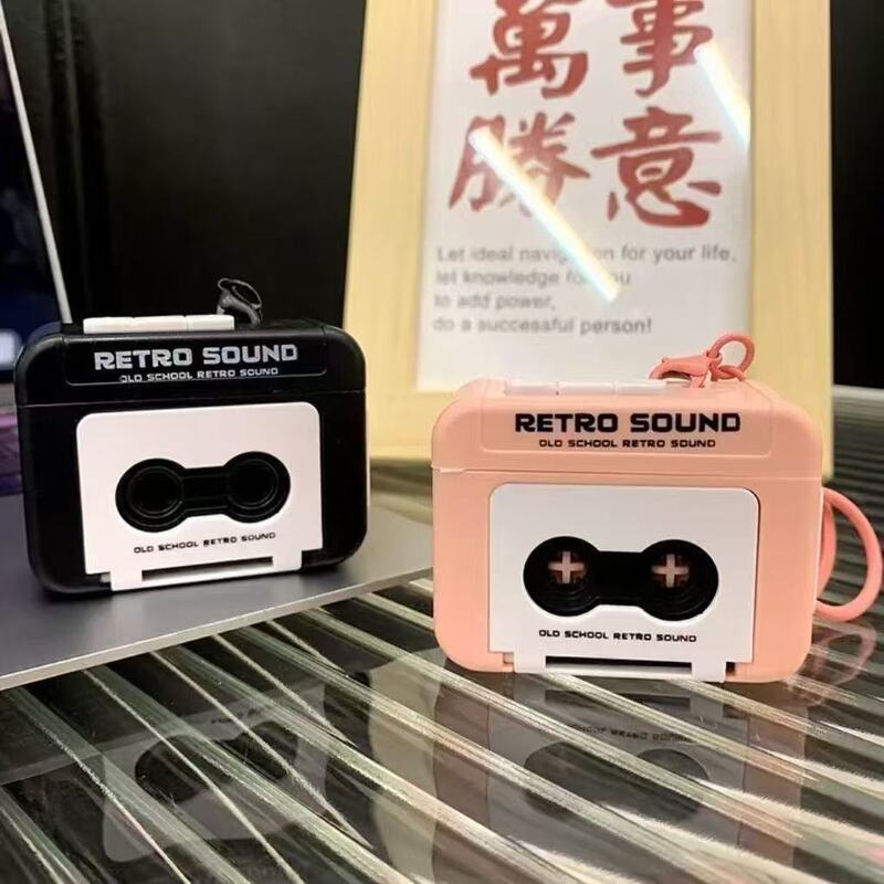 Black and pink cassette tape recorder keychain, mini retro radio, music box pendant that can sing and record Black and pink cassette tape recorder keychain, mini retro radio, music box pendant that can sing and record