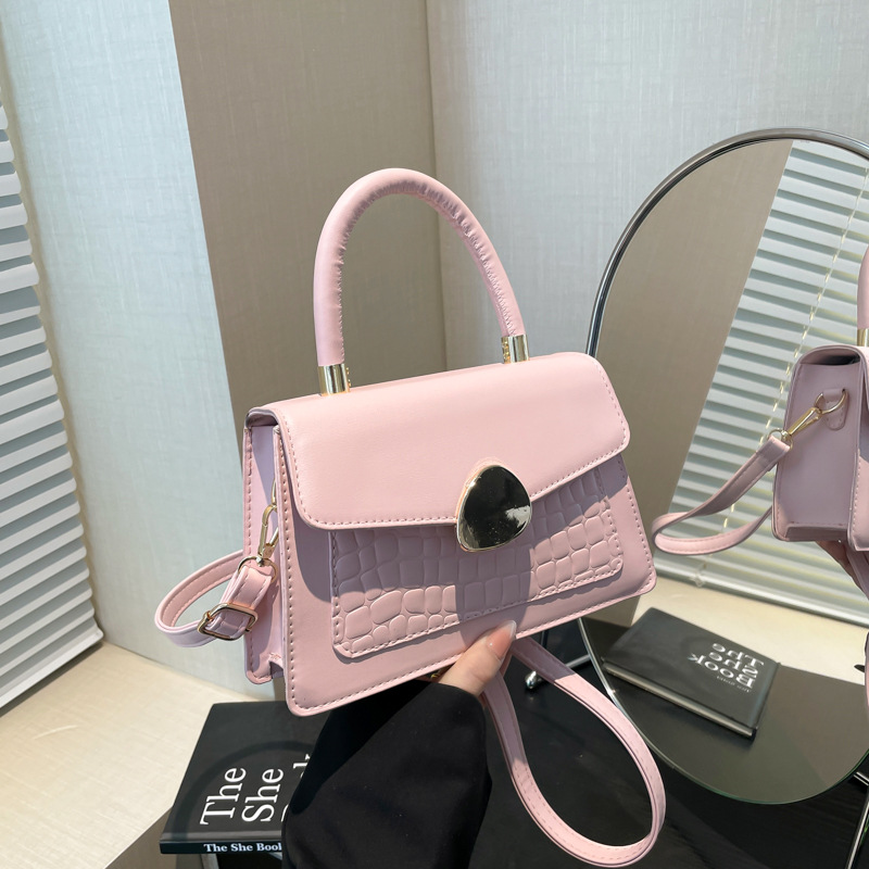 Textura hebilla magnética bolso de moda simple 2025 primavera nuevo estilo ins bolso de mensajero de un solo hombro elegante bolso cuadrado femenino