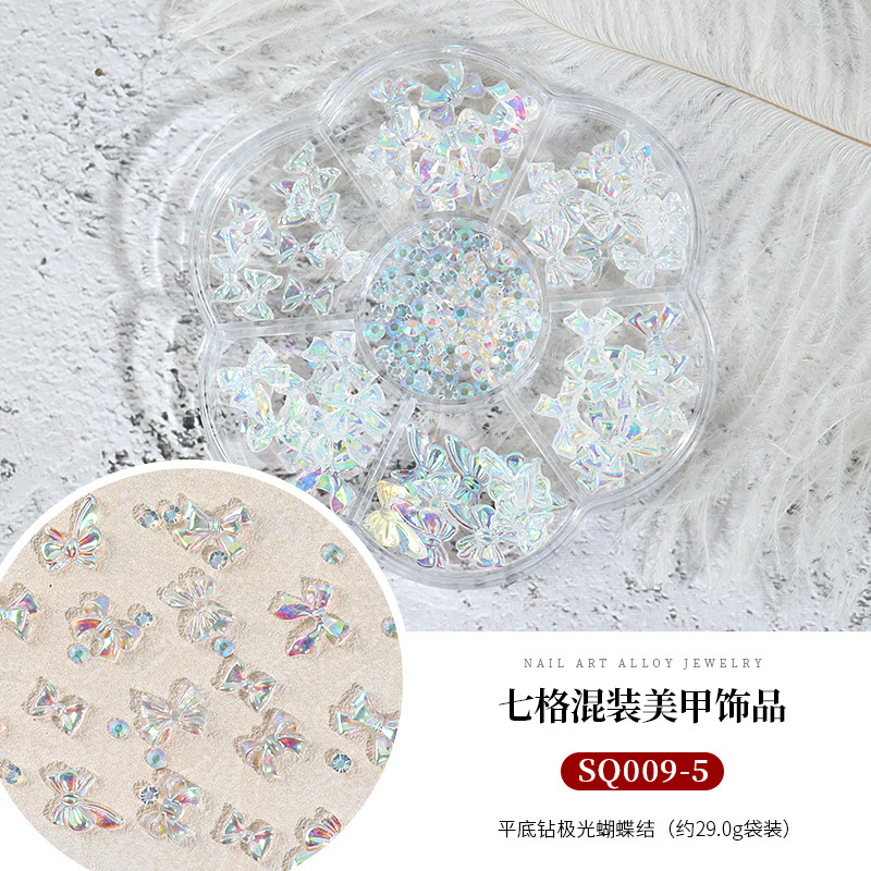 Seven-grid mixed Camellia nail jewelry bow flat diamond lollipop nail pequeña bola de acero Pearl Square Diamond