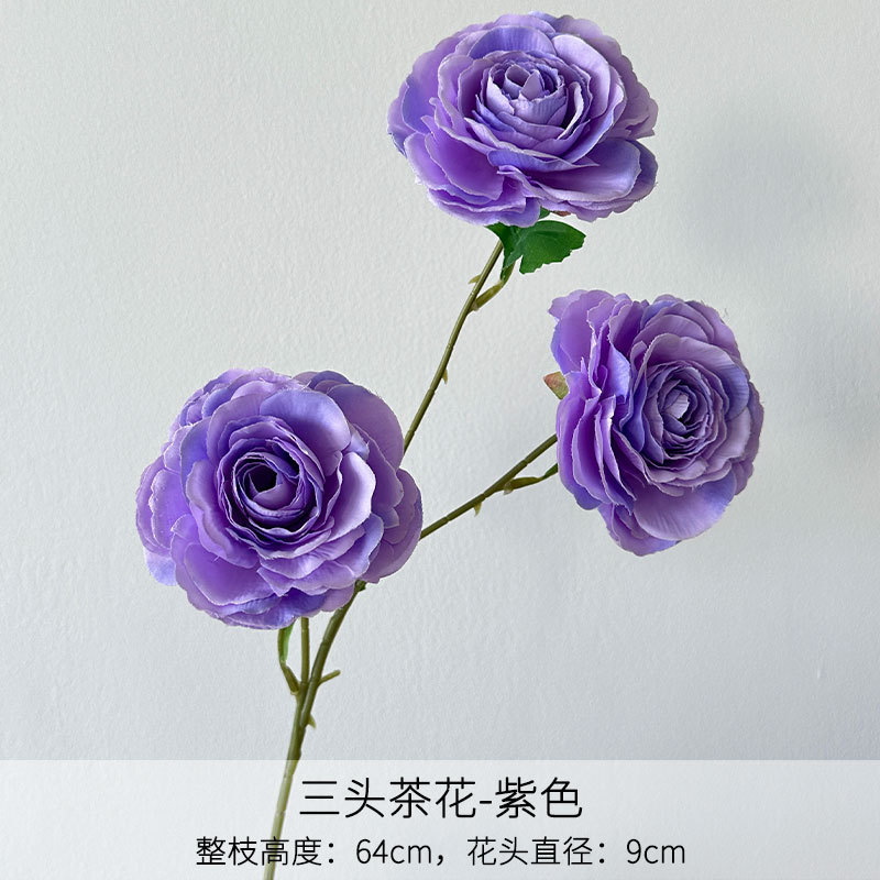 Camelia de tres cabezas morada