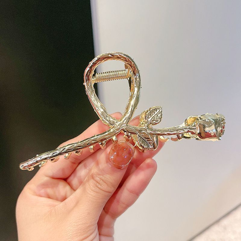 バラの金属のクリップの後頭部のヘアピンのネットの赤いディスクの髪の優雅な気質の高級感のカチューシャのサメのクリップの卸売り|undefined
