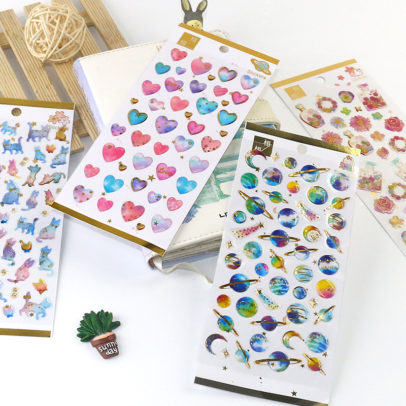 Suministro directo de fábrica japonés y coreano dorado fresco cristal epoxi pegatinas teléfono móvil pegatinas diario decorativo chica corazón mano cuenta pegatinas