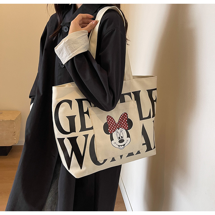 2024 New canvas bag for women, single-shoulder, student, book, large-capacity hand-held bag with zipper, versatile for office workers' commuting undefined
