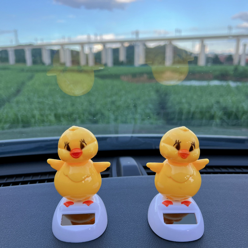 汽车太阳能摆件卡通车载装饰饰品创意摇头可爱公仔礼品 厂家直销详情2