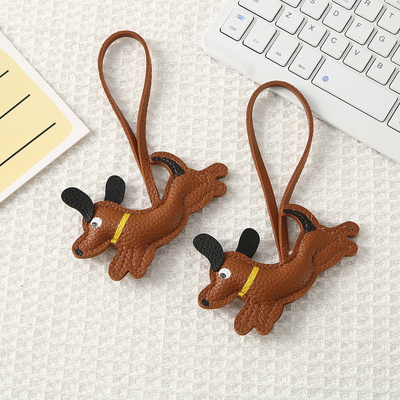 Cross-border new cartoon dachshund leather charm, cheerful little dog keychain lanyard, high-end bag accessory Cross-border new cartoon dachshund leather charm, cheerful little dog keychain lanyard, high-end bag accessory