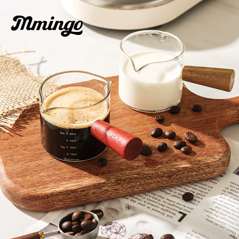 Coffee extract, measuring cup, glass concentrate scaled