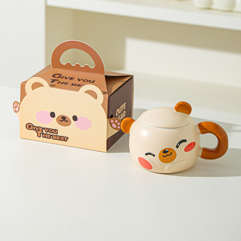 Taza de cerámica creativa de dibujos animados con tapa para desayuno casero de pareja de niños de alto valor de cara para acompañantes de regalo de taza