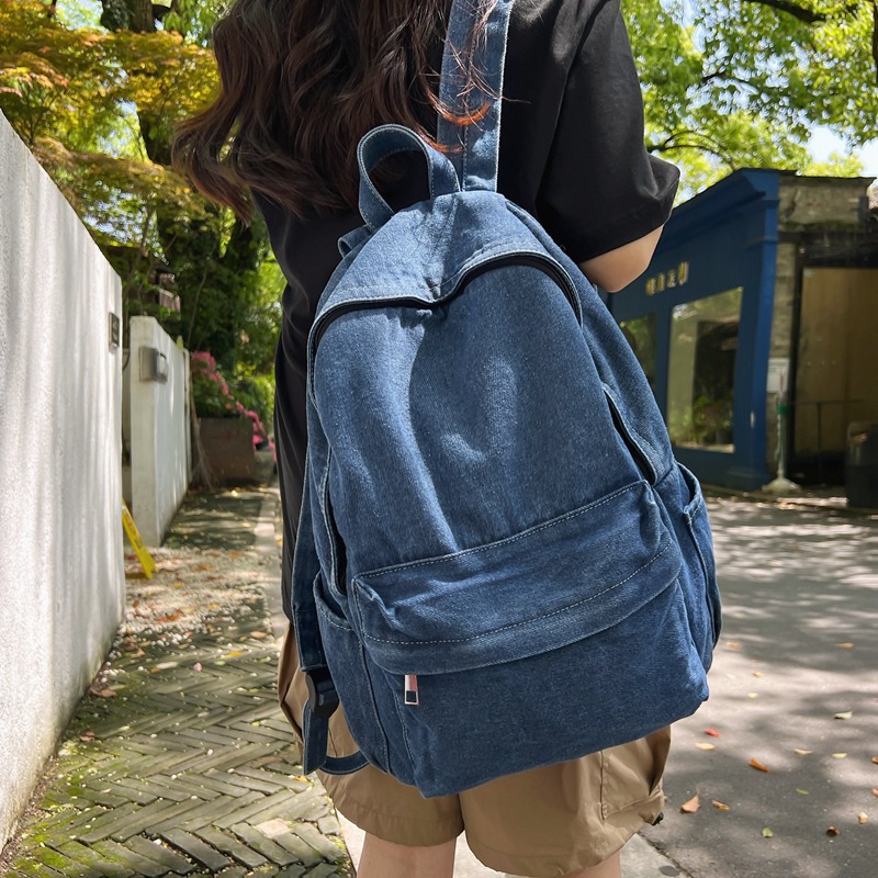 Mochila Mochila de mezclilla para estudiantes universitarios Mochila de gran capacidad para secundaria y preparatoria Mochila de viaje simple casual de moda al por mayor