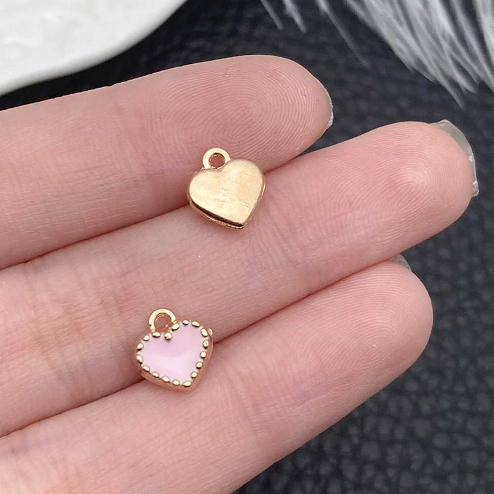 Un melocotón con aceite de gota rosa ama la forma del corazón 8x9mm - 18017 - 0,4g