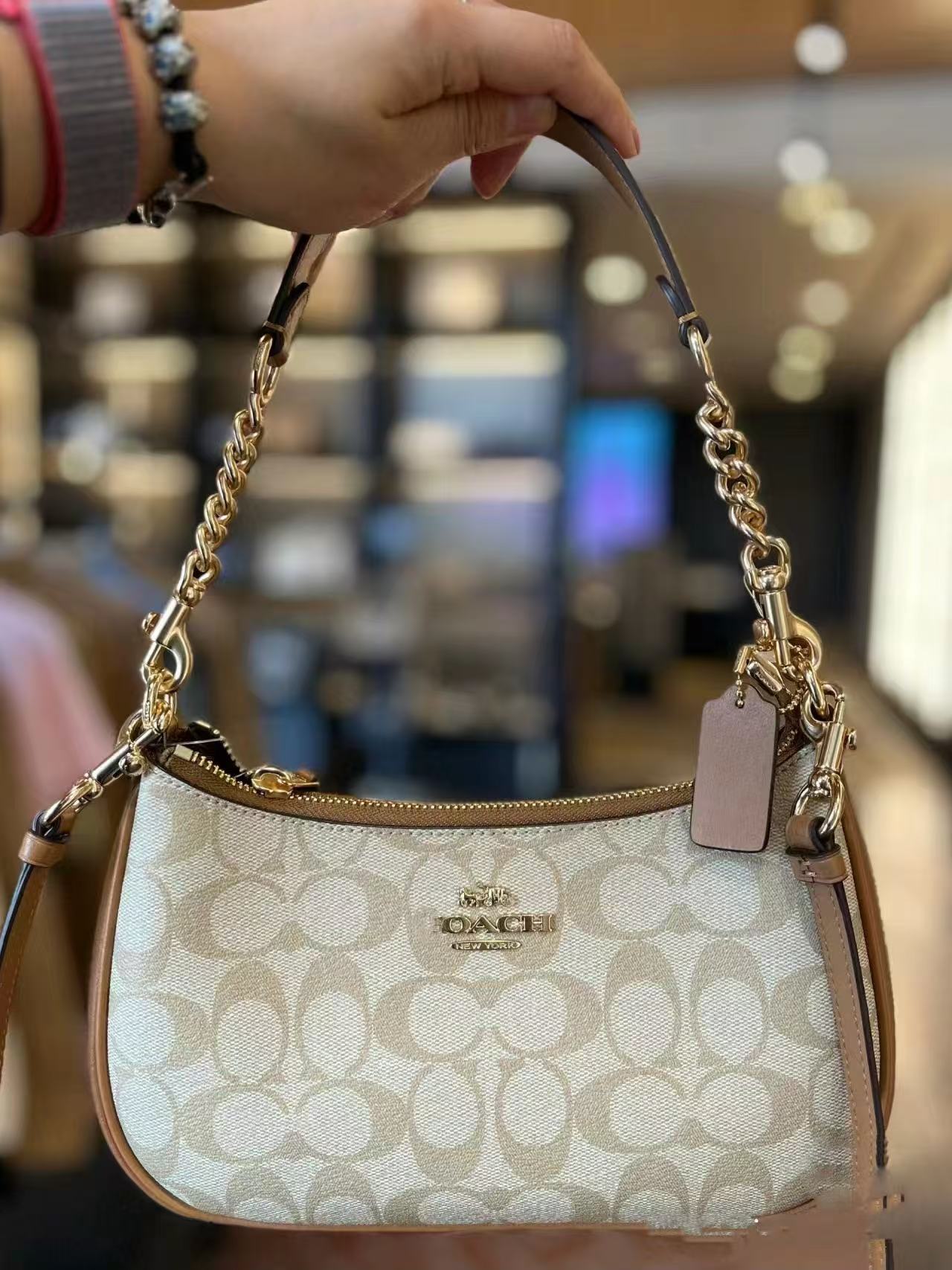 2025 Koujia nuevo bolso de axila de luna nueva Teri bolso de hombro con cremallera con cadena de impresión retro europea y americana