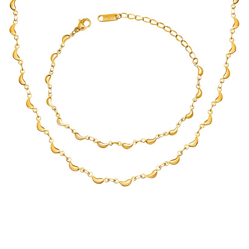 Conjunto de joyería transfronteriza chapada en oro, pequeño animal fresco y dulce europeo y americano, colgante de delfín, collar, material de acero de titanio